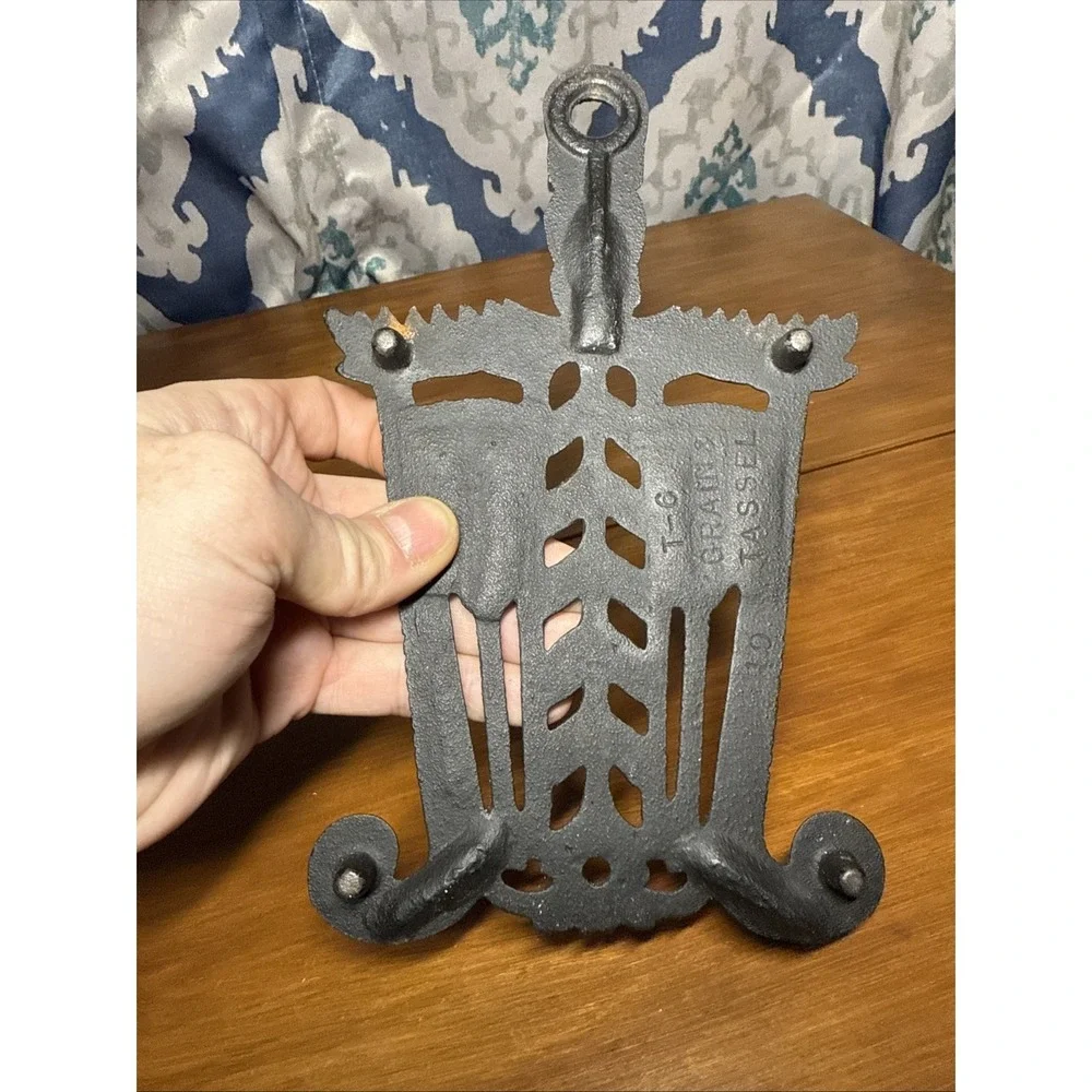 Vtg VM Tassel & Broom  Pennsylvania Dutch Style Cast Iron Trivet 8 5/8